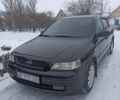 Черный Опель Астра, объемом двигателя 1.4 л и пробегом 250 тыс. км за 3600 $, фото 1 на Automoto.ua