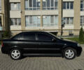 Чорний Опель Астра, об'ємом двигуна 1.39 л та пробігом 254 тис. км за 3900 $, фото 1 на Automoto.ua