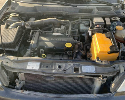 Черный Опель Астра, объемом двигателя 1.4 л и пробегом 216 тыс. км за 3500 $, фото 9 на Automoto.ua