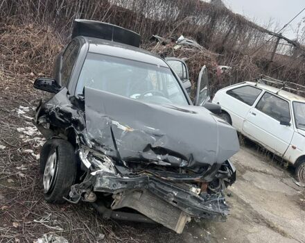 Черный Опель Астра, объемом двигателя 1.4 л и пробегом 150 тыс. км за 900 $, фото 1 на Automoto.ua