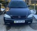 Черный Опель Астра, объемом двигателя 1.4 л и пробегом 240 тыс. км за 3450 $, фото 1 на Automoto.ua