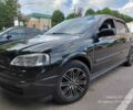 Черный Опель Астра, объемом двигателя 1.4 л и пробегом 184 тыс. км за 4150 $, фото 1 на Automoto.ua