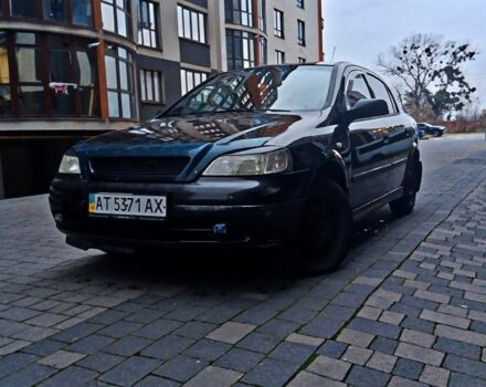 Черный Опель Астра, объемом двигателя 1.4 л и пробегом 214 тыс. км за 1800 $, фото 10 на Automoto.ua