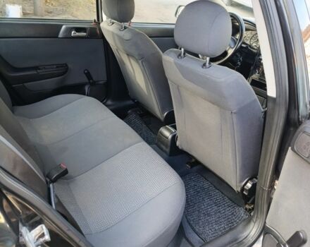 Черный Опель Астра, объемом двигателя 1.4 л и пробегом 136 тыс. км за 3900 $, фото 6 на Automoto.ua