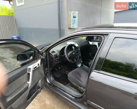 Черный Опель Астра, объемом двигателя 1.6 л и пробегом 147 тыс. км за 2700 $, фото 21 на Automoto.ua