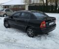 Черный Опель Астра, объемом двигателя 1.4 л и пробегом 200 тыс. км за 3300 $, фото 1 на Automoto.ua