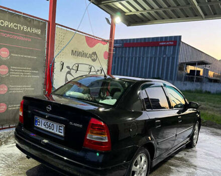Черный Опель Астра, объемом двигателя 1.36 л и пробегом 215 тыс. км за 3900 $, фото 8 на Automoto.ua
