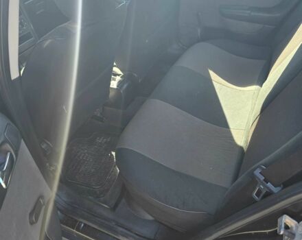 Черный Опель Астра, объемом двигателя 1.4 л и пробегом 240 тыс. км за 3000 $, фото 6 на Automoto.ua