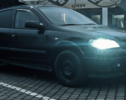 Черный Опель Астра, объемом двигателя 1.4 л и пробегом 214 тыс. км за 1800 $, фото 2 на Automoto.ua