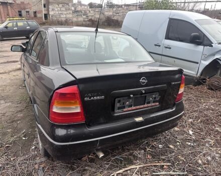 Черный Опель Астра, объемом двигателя 1.4 л и пробегом 150 тыс. км за 900 $, фото 3 на Automoto.ua