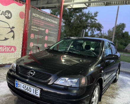 Черный Опель Астра, объемом двигателя 1.36 л и пробегом 215 тыс. км за 3900 $, фото 1 на Automoto.ua