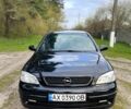 Черный Опель Астра, объемом двигателя 1.4 л и пробегом 200 тыс. км за 3900 $, фото 1 на Automoto.ua