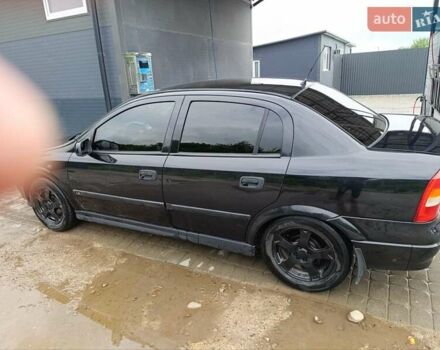 Черный Опель Астра, объемом двигателя 1.6 л и пробегом 147 тыс. км за 2700 $, фото 30 на Automoto.ua