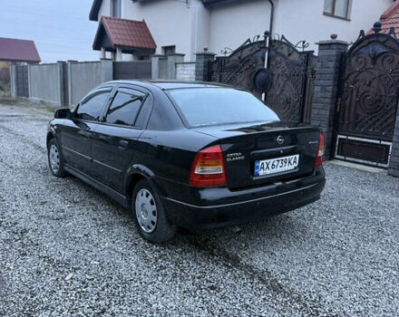 Черный Опель Астра, объемом двигателя 1.36 л и пробегом 260 тыс. км за 2900 $, фото 6 на Automoto.ua