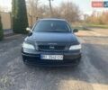 Черный Опель Астра, объемом двигателя 1.36 л и пробегом 234 тыс. км за 4400 $, фото 1 на Automoto.ua
