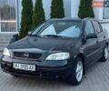 Черный Опель Астра, объемом двигателя 1.39 л и пробегом 201 тыс. км за 2500 $, фото 1 на Automoto.ua