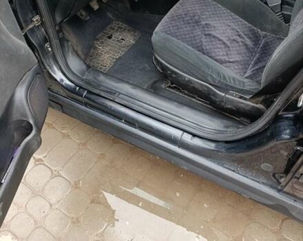 Черный Опель Астра, объемом двигателя 1.6 л и пробегом 147 тыс. км за 2700 $, фото 13 на Automoto.ua