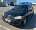 Черный Опель Астра, объемом двигателя 1.4 л и пробегом 200 тыс. км за 3500 $, фото 1 на Automoto.ua