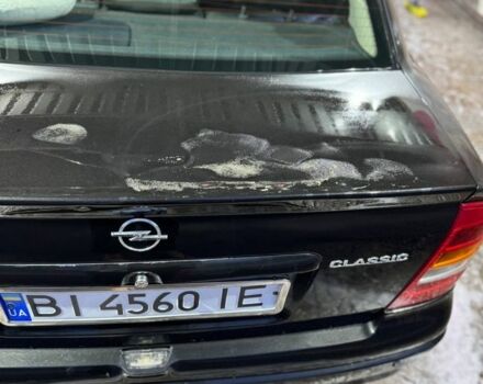 Черный Опель Астра, объемом двигателя 1.4 л и пробегом 215 тыс. км за 3500 $, фото 12 на Automoto.ua