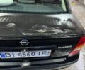 Черный Опель Астра, объемом двигателя 1.4 л и пробегом 215 тыс. км за 3500 $, фото 12 на Automoto.ua