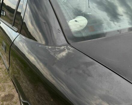 Черный Опель Астра, объемом двигателя 1.4 л и пробегом 215 тыс. км за 3500 $, фото 13 на Automoto.ua