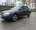 Черный Опель Астра, объемом двигателя 1.4 л и пробегом 200 тыс. км за 3800 $, фото 1 на Automoto.ua