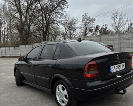 Черный Опель Астра, объемом двигателя 2 л и пробегом 300 тыс. км за 3800 $, фото 4 на Automoto.ua