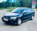 Черный Опель Астра, объемом двигателя 1.4 л и пробегом 183 тыс. км за 3700 $, фото 1 на Automoto.ua