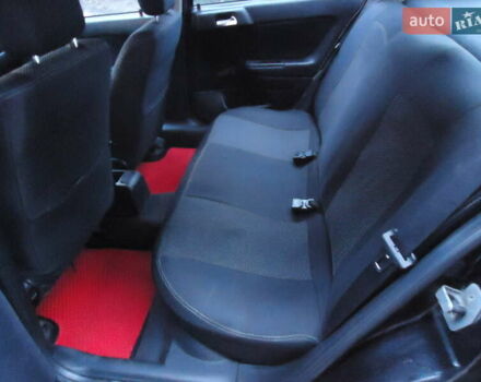 Черный Опель Астра, объемом двигателя 2 л и пробегом 300 тыс. км за 3500 $, фото 6 на Automoto.ua