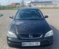 Черный Опель Астра, объемом двигателя 1.36 л и пробегом 318 тыс. км за 2600 $, фото 1 на Automoto.ua