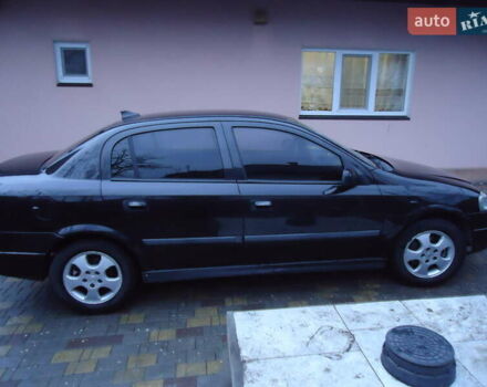 Черный Опель Астра, объемом двигателя 2 л и пробегом 300 тыс. км за 3500 $, фото 4 на Automoto.ua