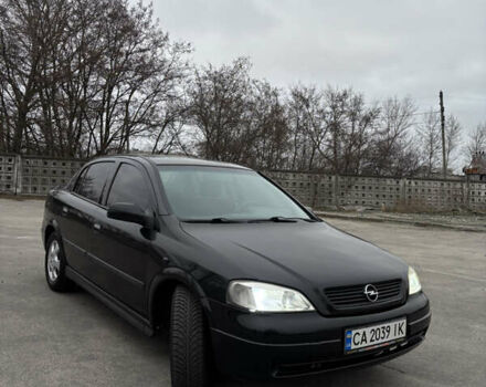 Черный Опель Астра, объемом двигателя 2 л и пробегом 300 тыс. км за 3800 $, фото 2 на Automoto.ua