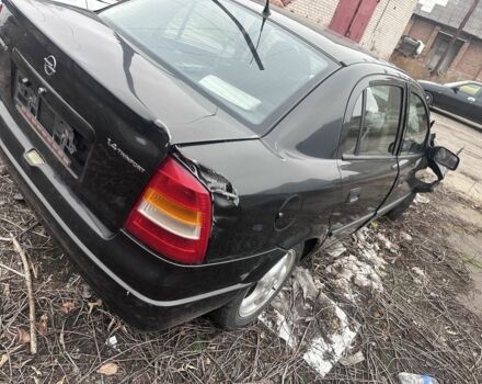 Черный Опель Астра, объемом двигателя 1.4 л и пробегом 150 тыс. км за 900 $, фото 4 на Automoto.ua