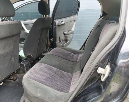 Черный Опель Астра, объемом двигателя 1.6 л и пробегом 147 тыс. км за 2700 $, фото 11 на Automoto.ua