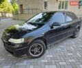 Черный Опель Астра, объемом двигателя 1.39 л и пробегом 161 тыс. км за 4999 $, фото 1 на Automoto.ua