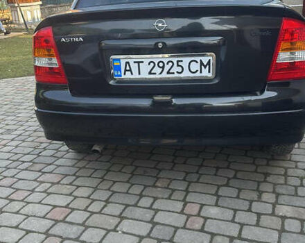 Черный Опель Астра, объемом двигателя 1.4 л и пробегом 210 тыс. км за 3300 $, фото 1 на Automoto.ua