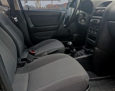 Черный Опель Астра, объемом двигателя 1.4 л и пробегом 214 тыс. км за 1800 $, фото 22 на Automoto.ua