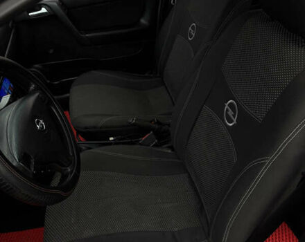 Черный Опель Астра, объемом двигателя 2 л и пробегом 300 тыс. км за 3800 $, фото 6 на Automoto.ua