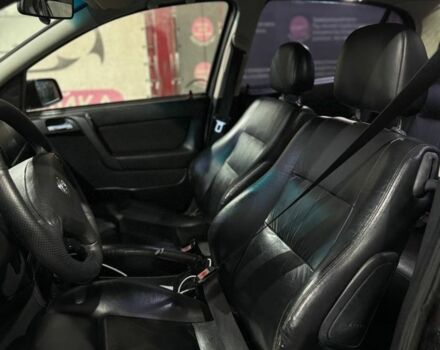 Черный Опель Астра, объемом двигателя 1.4 л и пробегом 215 тыс. км за 3500 $, фото 6 на Automoto.ua