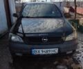 Черный Опель Астра, объемом двигателя 1.4 л и пробегом 230 тыс. км за 3100 $, фото 1 на Automoto.ua