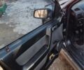 Черный Опель Астра, объемом двигателя 1.4 л и пробегом 230 тыс. км за 3100 $, фото 5 на Automoto.ua
