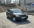 Черный Опель Астра, объемом двигателя 1.4 л и пробегом 265 тыс. км за 3900 $, фото 1 на Automoto.ua