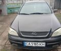 Черный Опель Астра, объемом двигателя 1.4 л и пробегом 280 тыс. км за 3700 $, фото 1 на Automoto.ua