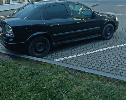 Черный Опель Астра, объемом двигателя 1.39 л и пробегом 214 тыс. км за 1800 $, фото 6 на Automoto.ua