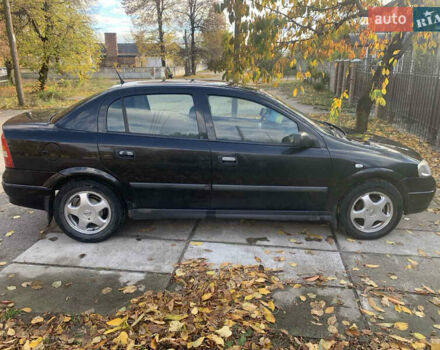 Черный Опель Астра, объемом двигателя 1.4 л и пробегом 216 тыс. км за 3500 $, фото 2 на Automoto.ua