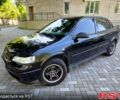 Черный Опель Астра, объемом двигателя 1.4 л и пробегом 159 тыс. км за 4999 $, фото 1 на Automoto.ua