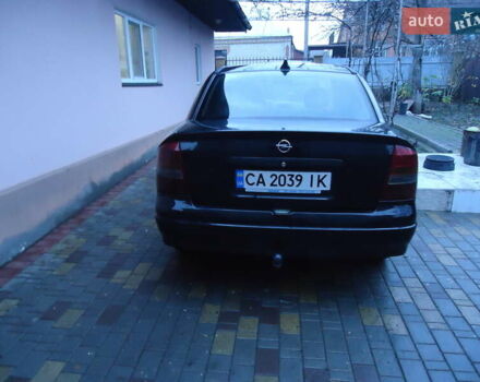 Черный Опель Астра, объемом двигателя 2 л и пробегом 300 тыс. км за 3500 $, фото 2 на Automoto.ua