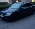 Черный Опель Астра, объемом двигателя 1.4 л и пробегом 214 тыс. км за 1800 $, фото 5 на Automoto.ua