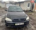 Черный Опель Астра, объемом двигателя 1.4 л и пробегом 380 тыс. км за 3200 $, фото 1 на Automoto.ua