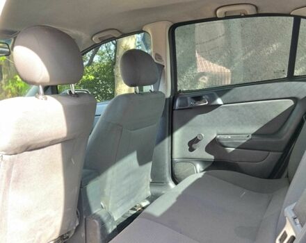 Черный Опель Астра, объемом двигателя 1.4 л и пробегом 304 тыс. км за 3250 $, фото 6 на Automoto.ua